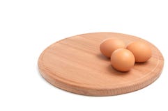 Three Eggs And Round Board. Stock Images