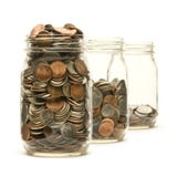 Three Glass Jars Filled With American Coins Stock Photos Three Glass Jars Filled With American Coins Stock Photos