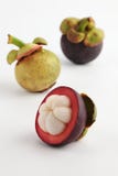 Three Mangosteens Royalty Free Stock Images