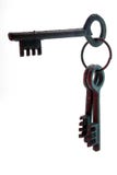 Three old fashinoed keys on a ring isolated. Royalty Free Stock Images Three old fashinoed keys on a ring isolated. Royalty Free Stock Images