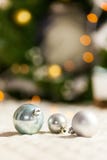 Three Pearl Christmas balls with colorful bokeh stock image Three Pearl Christmas balls with colorful bokeh stock image