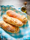 Three white bread baguett with olive oil Royalty Free Stock Photography Three white bread baguett with olive oil Royalty Free Stock Photography