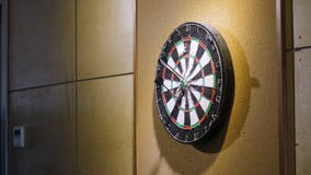 Throw the dart at the dart Board. Concept of success. Playing Darts Stock Image Throw the dart at the dart Board. Concept of success. Playing Darts Stock Image