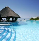 Tiki Hut And Bar By Swimming Pool Of Luxury Hotel Stock Photo Tiki Hut And Bar By Swimming Pool Of Luxury Hotel Stock Photo