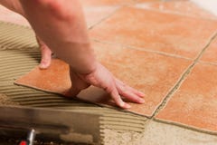 Tiler Tiling Tiles On The Floor Stock Photography Tiler Tiling Tiles On The Floor Stock Photography