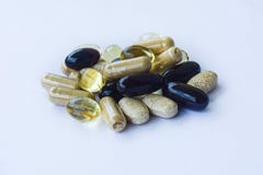 Tillägg - vitaminmineraler, omegaoljor royaltyfri foto Tillägg - vitaminmineraler, omegaoljor royaltyfri foto