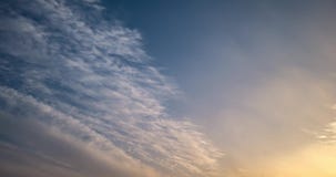 Time lapse hdri clip of evening fluffy curly rolling clouds with setting sun stock video footage Time lapse hdri clip of evening fluffy curly rolling clouds with setting sun stock video footage