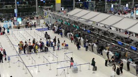 Time lapse of passengers wait at the check in queue in departure terminal