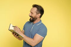 Time management skills. Man planning schedule hold notepad. Man bearded manager happy smiling face. Successful man stock photo Time management skills. Man planning schedule hold notepad. Man bearded manager happy smiling face. Successful man stock photo