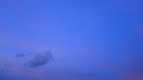 TimeLapse of Evening colorful twilight horizon with pink purple & gray clouds