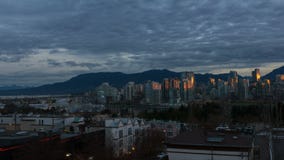 Timelapse Movie of Moving Clouds and Blue Sky Over Granville Island Vancouver BC Canada at Sunrise One Early Morning at Dawn