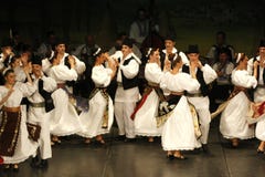 TIMISOARA, ROMANIA- 12. 10.2014 Romanian dancers in traditional costume, perform a folkore traditional dance stock photos TIMISOARA, ROMANIA- 12. 10.2014 Romanian dancers in traditional costume, perform a folkore traditional dance stock photos