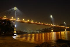 Ting Kau Bridge in Hong Kong - across the golden color sea