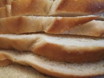 Tir en gros plan des coupes en pain de levain images stock Tir en gros plan des coupes en pain de levain images stock