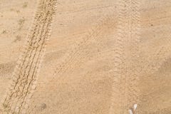 Tire tracks on dry brown yellow dirt road royalty free stock photo Tire tracks on dry brown yellow dirt road royalty free stock photo
