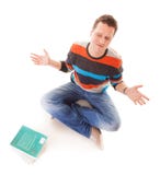 Tired college student with stack of books studying for exams isolated Stock Photo Tired college student with stack of books studying for exams isolated Stock Photo