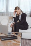 tired young businesswoman with headache sitting on armchair stock image tired young businesswoman with headache sitting on armchair stock image