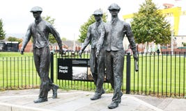 Titanic People statue of Belfast Shipyard workers stock image Titanic People statue of Belfast Shipyard workers stock image