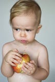 Toddler Eating Apple Royalty Free Stock Photos