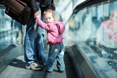 Toddler Girl And Her Father On An Escalator Stock Images