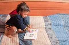 Free Toddler Reading Book Stock Photography - 13430932