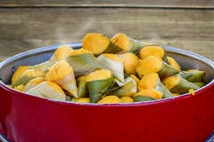 Toddy palm cakes in a red pot stock photo Toddy palm cakes in a red pot stock photo