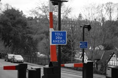 Toll road sign with barrier and price stock photo Toll road sign with barrier and price stock photo