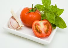 Tomato, Garlic And Basil Stock Images