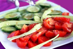 Tomatoes and Cucumbers stock image Tomatoes and Cucumbers stock image