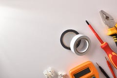 Tools and electrical material on white table space left stock photography Tools and electrical material on white table space left stock photography