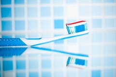 Toothbrush with red stripe toothpaste Royalty Free Stock Image Toothbrush with red stripe toothpaste Royalty Free Stock Image