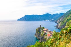 Top aerial view of Vernazza typical village with colorful buildings houses, Castello Doria castle on rock cliff and Genoa Gulf, Li royalty free stock photo Top aerial view of Vernazza typical village with colorful buildings houses, Castello Doria castle on rock cliff and Genoa Gulf, Li royalty free stock photo