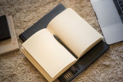 A top-down view of an open journal of blank pages, glowing warml royalty free stock photography A top-down view of an open journal of blank pages, glowing warml royalty free stock photography