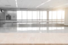 Top empty wood table on blurred abstract hallway background. stock images Top empty wood table on blurred abstract hallway background. stock images