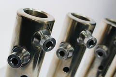 Top part of large diameter electric cable connection tubes with allen key screws, made of stainless steel stock images Top part of large diameter electric cable connection tubes with allen key screws, made of stainless steel stock images
