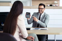 Top sales manager and customer at dealership showroom royalty free stock photo Top sales manager and customer at dealership showroom royalty free stock photo