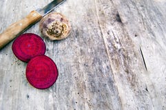 Top shot, close up of colorful freshly harvesting, organic, crunchy, juicy fresh cutted root vegetables, red beets on rustic stock photography Top shot, close up of colorful freshly harvesting, organic, crunchy, juicy fresh cutted root vegetables, red beets on rustic stock photography