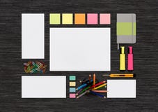 Top view of blank colorful stationery mock up on black office de stock image Top view of blank colorful stationery mock up on black office de stock image