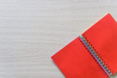 Top view of Blank notebook on wood background with copy space stock photography Top view of Blank notebook on wood background with copy space stock photography