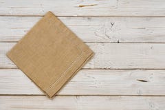 Top view of brown kitchen napkin on wooden planks background stock photography Top view of brown kitchen napkin on wooden planks background stock photography