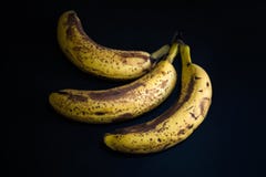 Top view of brown spotted bananas. Banana with dark black spots stock images Top view of brown spotted bananas. Banana with dark black spots stock images