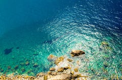 Seaside stone rock coast of turquoise water, Scilla, Southern It stock photography Seaside stone rock coast of turquoise water, Scilla, Southern It stock photography