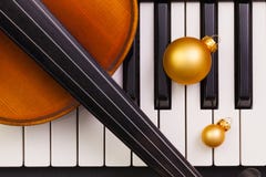 Top view close up shot of piano keyboard,old violin and Christma Stock Image Top view close up shot of piano keyboard,old violin and Christma Stock Image