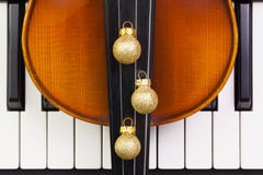 Top view close up shot of piano keyboard,old violin and Christma Stock Photos Top view close up shot of piano keyboard,old violin and Christma Stock Photos