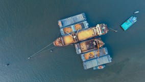 Top view of container ship loading agricultural product in river royalty free stock photos Top view of container ship loading agricultural product in river royalty free stock photos