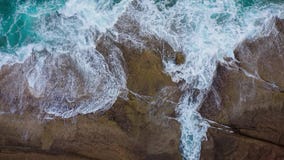 Top view of the desert stony coast on the Atlantic Ocean. Coast of the island of Tenerife. Aerial drone footage of sea stock video footage Top view of the desert stony coast on the Atlantic Ocean. Coast of the island of Tenerife. Aerial drone footage of sea stock video footage