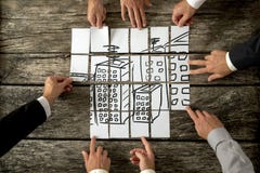 Top view of eight architects cooperating in urban development Royalty Free Stock Image Top view of eight architects cooperating in urban development Royalty Free Stock Image