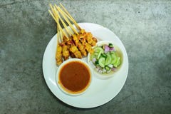 Top view Grilled Pork Satay with Peanut Sauce pickles which are royalty free stock photos Top view Grilled Pork Satay with Peanut Sauce pickles which are royalty free stock photos