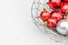 Simple red and silver christmas balls in snow background stock photography Simple red and silver christmas balls in snow background stock photography