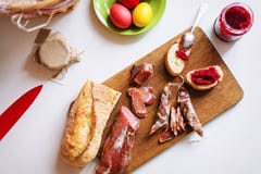 Top view horizontal image of various meats on serving board. Ham, pork, beef, easter eggs and homemade bread with royalty free stock image Top view horizontal image of various meats on serving board. Ham, pork, beef, easter eggs and homemade bread with royalty free stock image